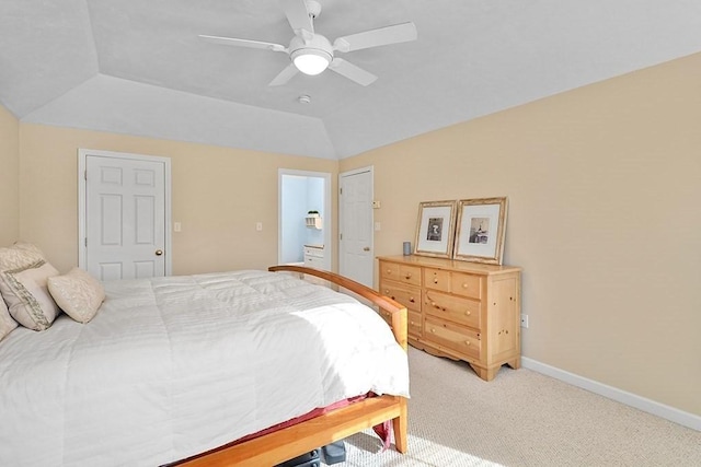 carpeted bedroom featuring ceiling fan and vaulted ceiling