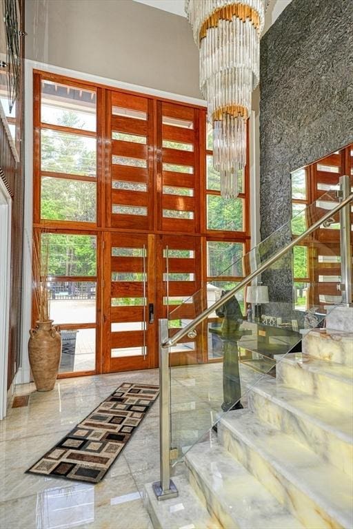 290 Massapoag Rd, Tyngsborough, MA 01879 - foyer with a chandelier, a towering ceiling, marble tiled floors, and healthy amount of natural light