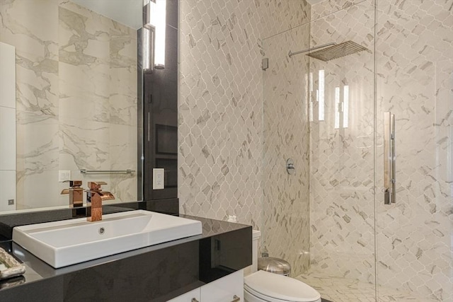 290 Massapoag Rd, Tyngsborough, MA 01879 - bathroom with vanity, a stall shower, tile walls, and toilet