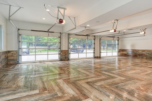 290 Massapoag Rd, Tyngsborough, MA 01879 - garage with a garage door opener, recessed lighting, and a wainscoted wall