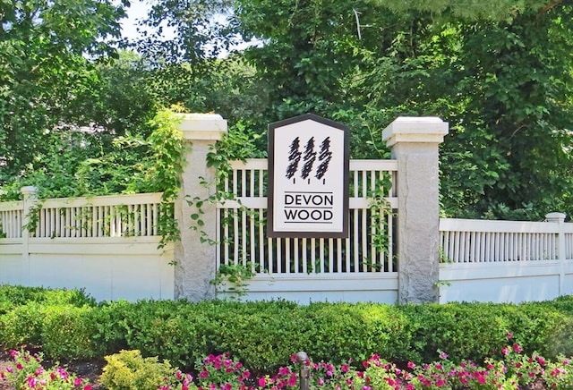 view of gate with fence