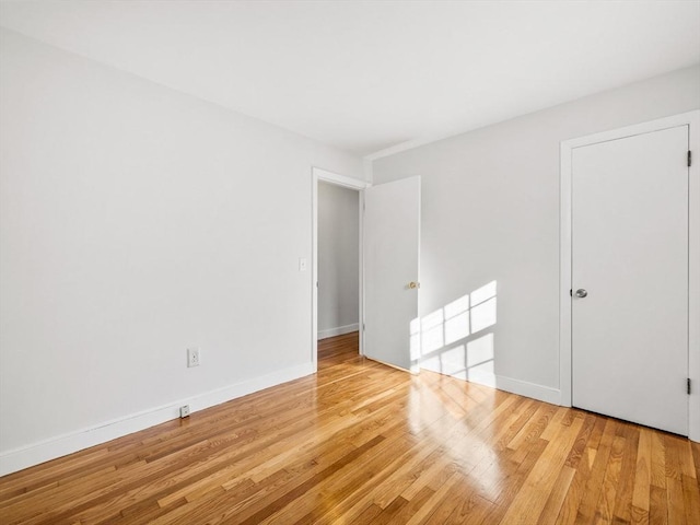 unfurnished room featuring light hardwood / wood-style floors