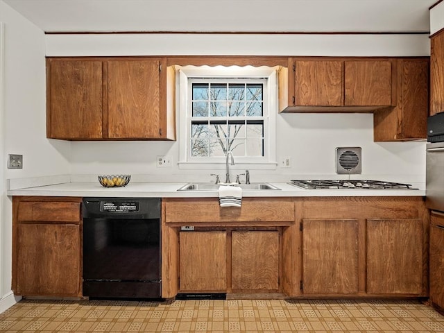 kitchen featuring appliances with stainless steel finishes and sink