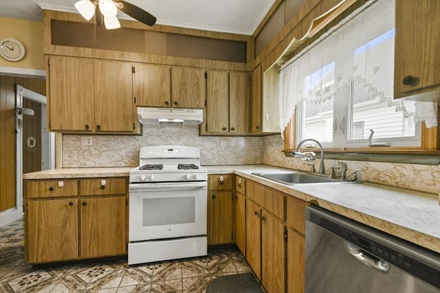 23 Highland Rd, Somerville, MA 02144 - kitchen featuring white gas range oven, under cabinet range hood, stainless steel dishwasher, light countertops, and a ceiling fan