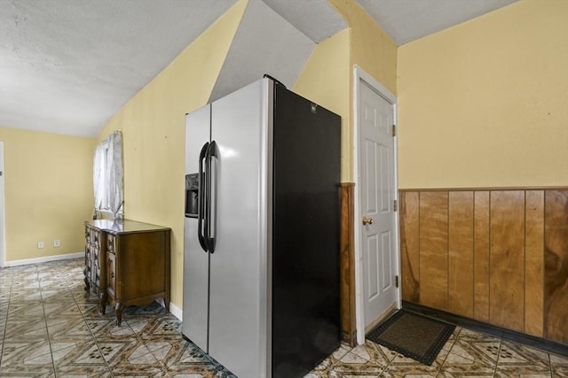 23 Highland Rd, Somerville, MA 02144 - kitchen with stainless steel fridge and baseboards
