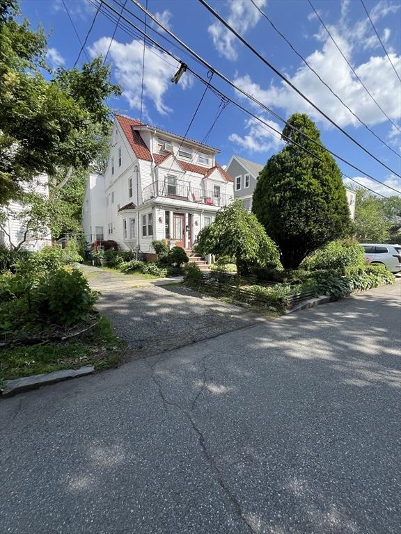 23 Highland Rd, Somerville, MA 02144 - view of home's exterior with a balcony