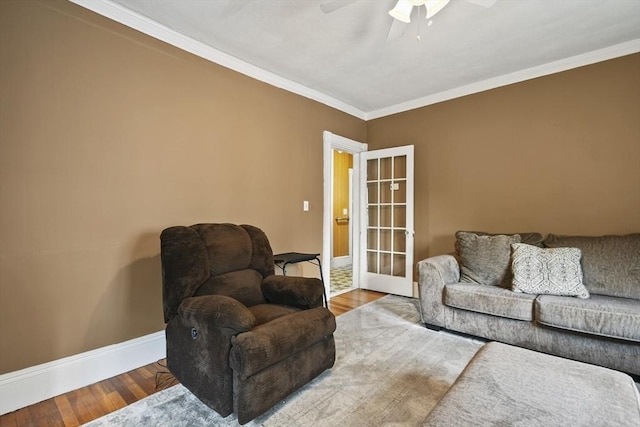 23 Highland Rd, Somerville, MA 02144 - living room with a ceiling fan, crown molding, and wood finished floors