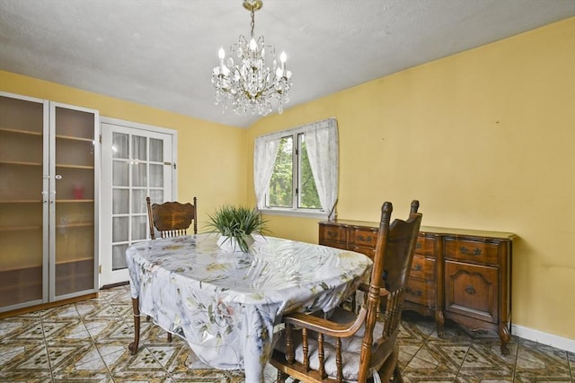 23 Highland Rd, Somerville, MA 02144 - dining area with a chandelier and vaulted ceiling