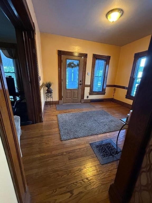 entrance foyer featuring hardwood / wood-style floors