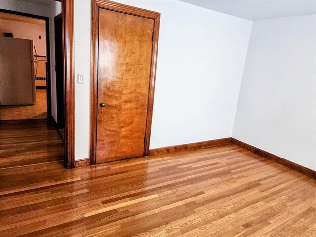 55 Kilburn St, Revere, MA 02151 - unfurnished bedroom featuring baseboards and wood finished floors