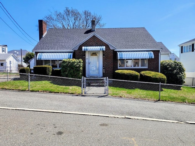 55 Kilburn St, Revere, MA 02151 - view of front of property with a fenced front yard, brick siding, a chimney, a gate, and roof with shingles