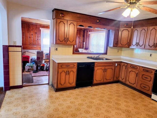 55 Kilburn St, Revere, MA 02151 - kitchen featuring a sink, light countertops, dishwasher, light floors, and a ceiling fan