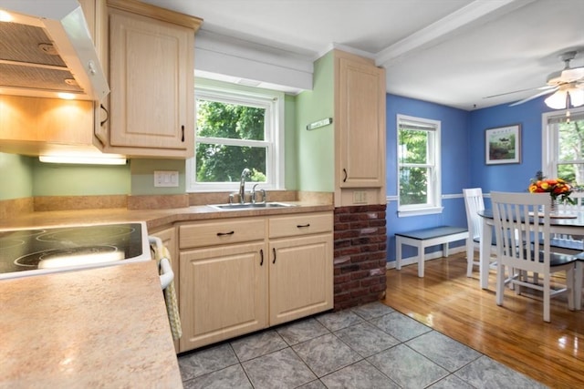 2 Olympia Ave, Woburn, MA 01801 - kitchen featuring exhaust hood, light brown cabinets, a sink, light tile patterned floors, and ceiling fan