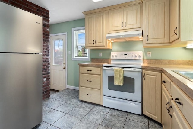 2 Olympia Ave, Woburn, MA 01801 - kitchen with freestanding refrigerator, under cabinet range hood, white range with electric stovetop, and light brown cabinetry