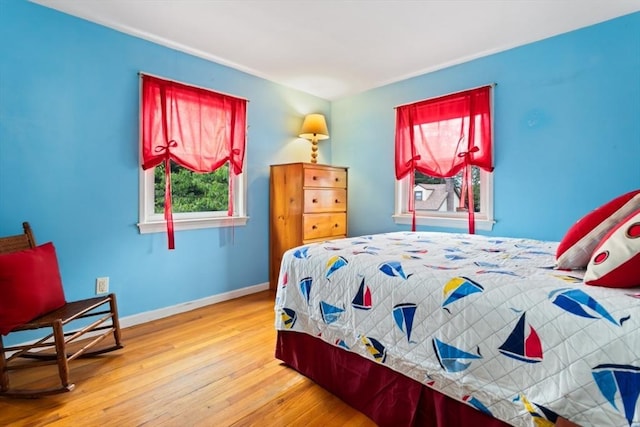 2 Olympia Ave, Woburn, MA 01801 - bedroom with hardwood / wood-style flooring and baseboards