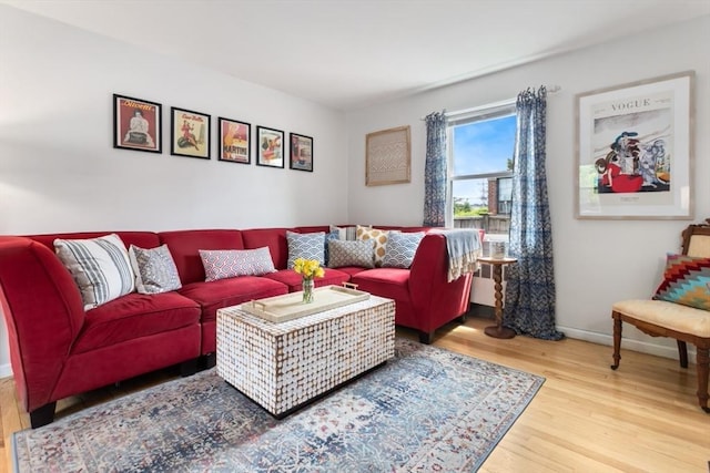 2 Olympia Ave, Woburn, MA 01801 - living area featuring wood finished floors and baseboards
