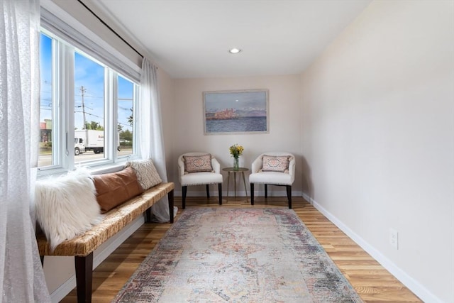 2 Olympia Ave, Woburn, MA 01801 - sitting room featuring wood finished floors, baseboards, and recessed lighting