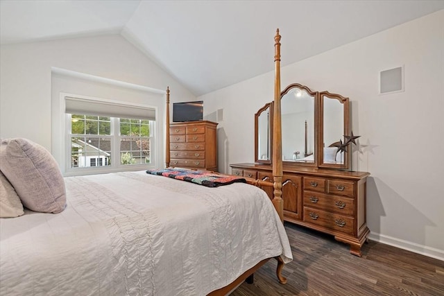 bedroom with dark wood-type flooring, vaulted ceiling, and baseboards