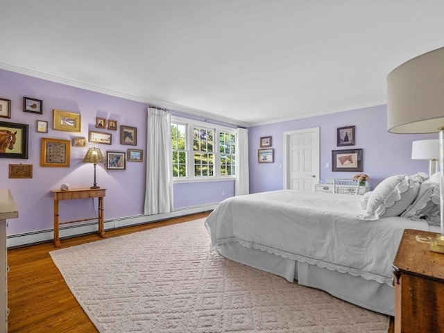 21A Farm St, Dover, MA 02030 - bedroom featuring wood finished floors, baseboard heating, and crown molding