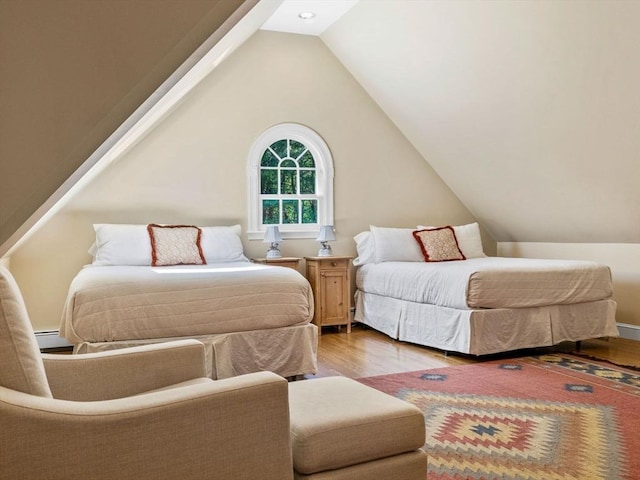 21A Farm St, Dover, MA 02030 - bedroom featuring wood finished floors, vaulted ceiling, and baseboard heating