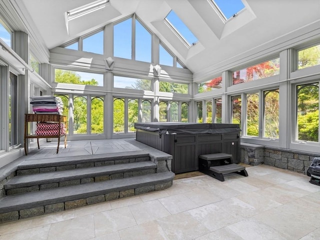 21A Farm St, Dover, MA 02030 - sunroom featuring a hot tub, a skylight, vaulted ceiling, and plenty of natural light