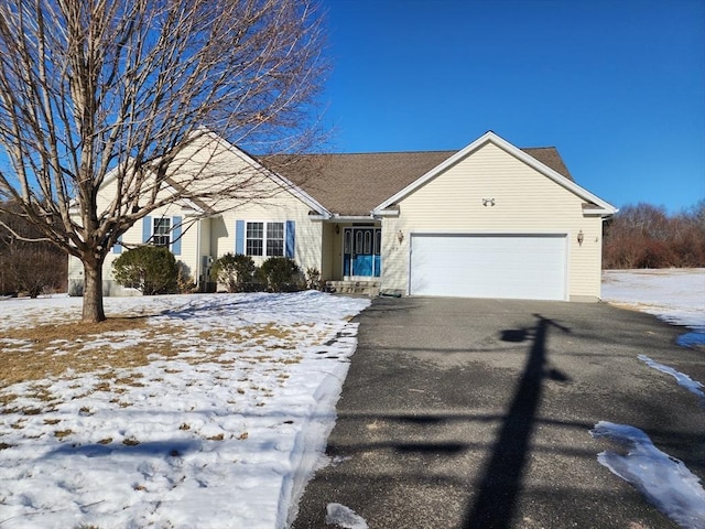 ranch-style home with a garage