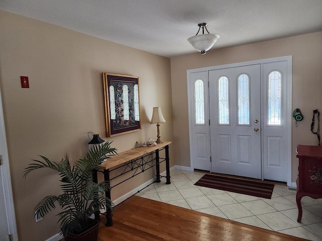 view of tiled entrance foyer