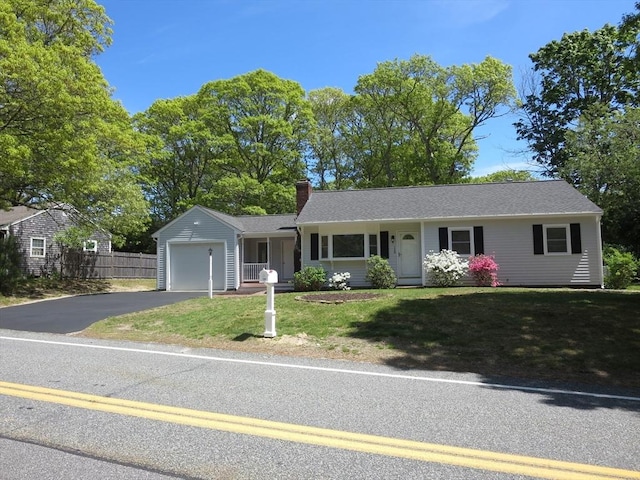 130 Fuller Rd, Barnstable, MA 02632 - ranch-style house with driveway, an attached garage, and a chimney