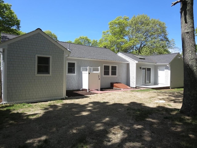 130 Fuller Rd, Barnstable, MA 02632 - rear view of house featuring a shingled roof