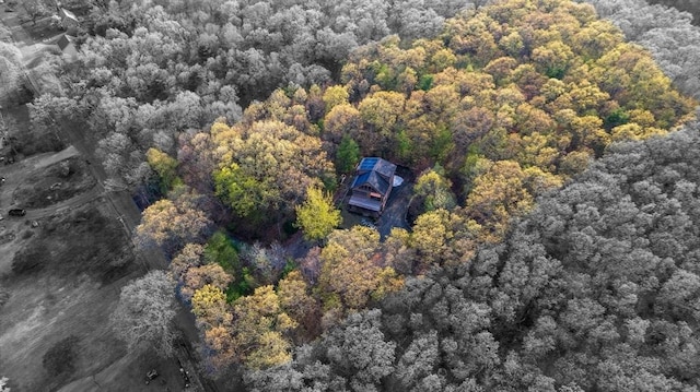 aerial view featuring a view of trees