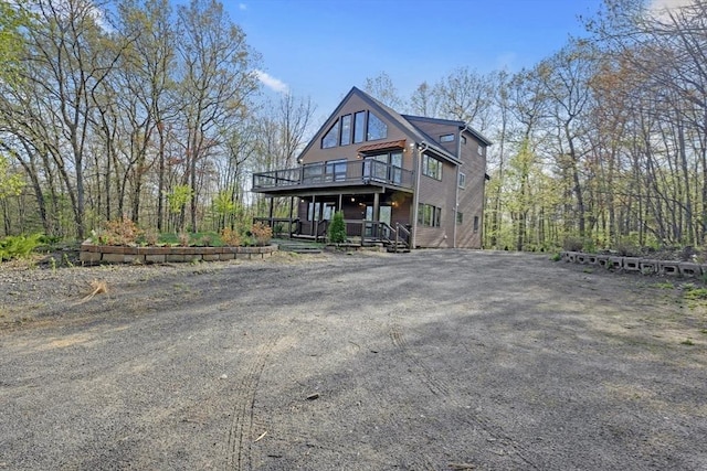 exterior space featuring a wooden deck