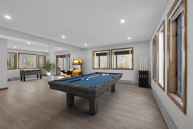 rec room with pool table, recessed lighting, light wood finished floors, baseboard heating, and baseboards