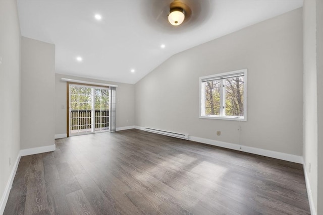 empty room featuring lofted ceiling, a baseboard radiator, recessed lighting, baseboards, and wood finished floors