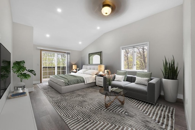 bedroom featuring vaulted ceiling, wood finished floors, recessed lighting, and access to exterior