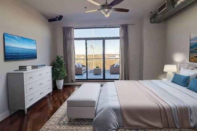 bedroom featuring access to exterior, dark wood-type flooring, and ceiling fan