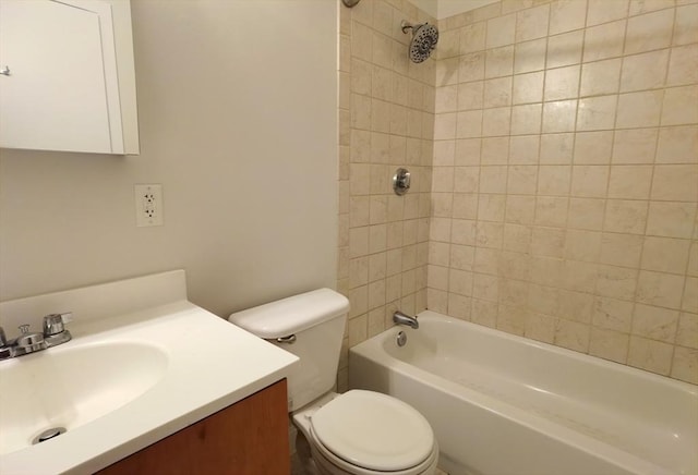 full bathroom with vanity, toilet, and tiled shower / bath combo