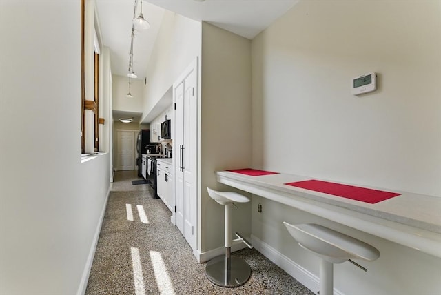 235 State St Unit 406, Springfield, MA 01103 - hallway featuring baseboards