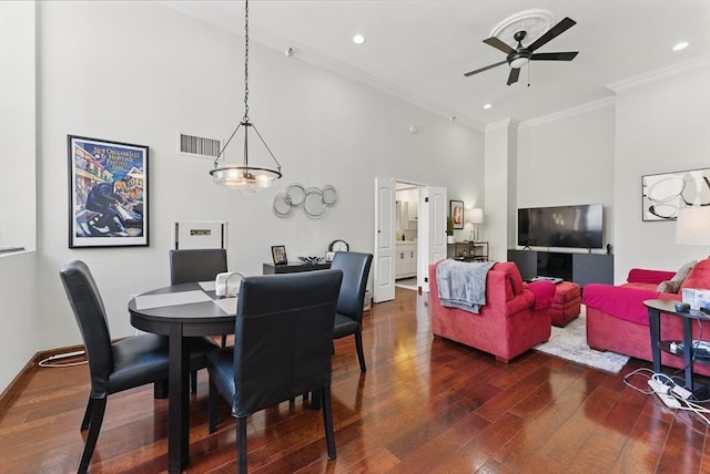235 State St Unit 406, Springfield, MA 01103 - dining room with dark wood-style flooring, ornamental molding, a ceiling fan, a towering ceiling, and recessed lighting