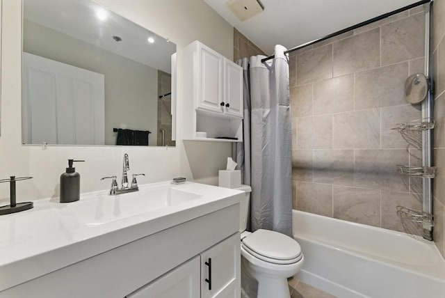 235 State St Unit 406, Springfield, MA 01103 - bathroom featuring toilet, vanity, and shower / bath combo with shower curtain