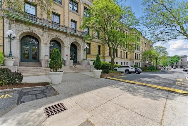 235 State St Unit 406, Springfield, MA 01103 - property entrance with french doors, a residential view, and stone siding
