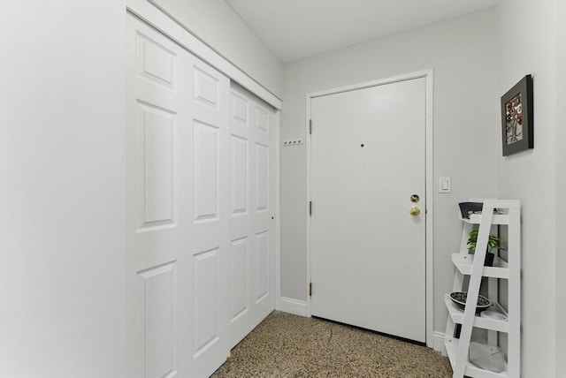 235 State St Unit 406, Springfield, MA 01103 - entryway with speckled floor and baseboards