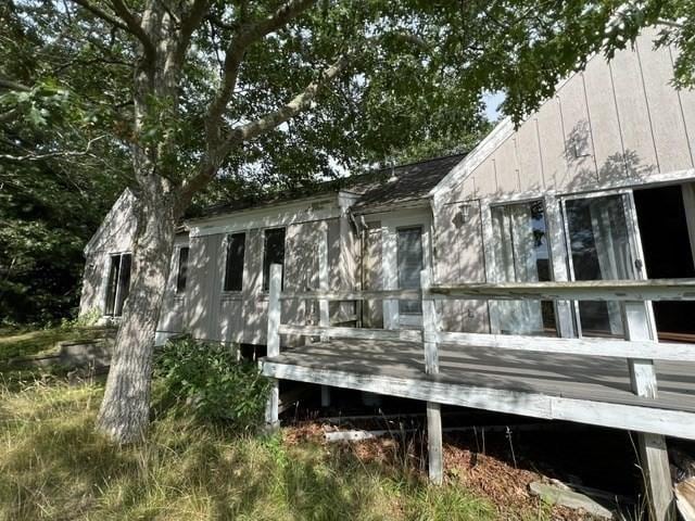 view of home's exterior featuring a deck