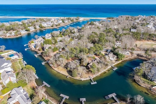 bird's eye view with a water view and a residential view
