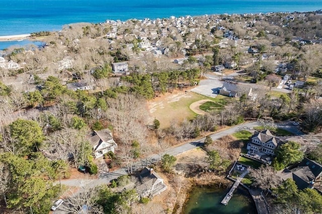 bird's eye view with a residential view and a water view
