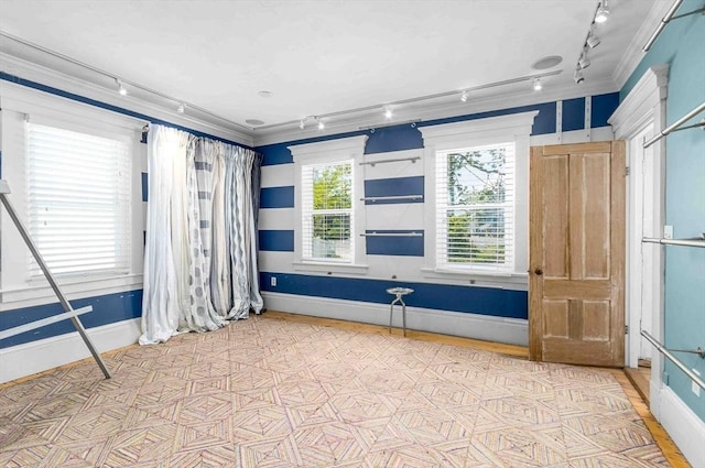 8 S St, Dennis, MA 02639 - empty room featuring track lighting and baseboards