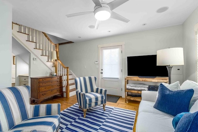 8 S St, Dennis, MA 02639 - living room featuring wood finished floors, a ceiling fan, and stairs