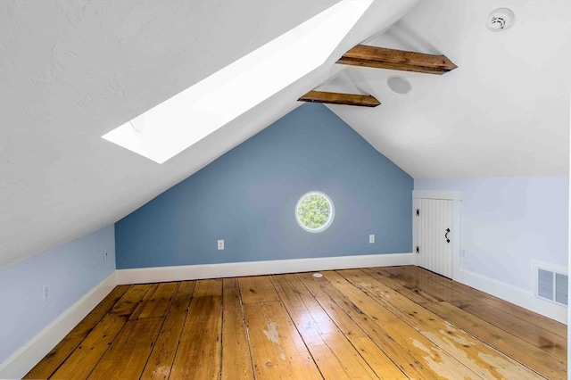8 S St, Dennis, MA 02639 - bonus room featuring a skylight, hardwood / wood-style flooring, and baseboards