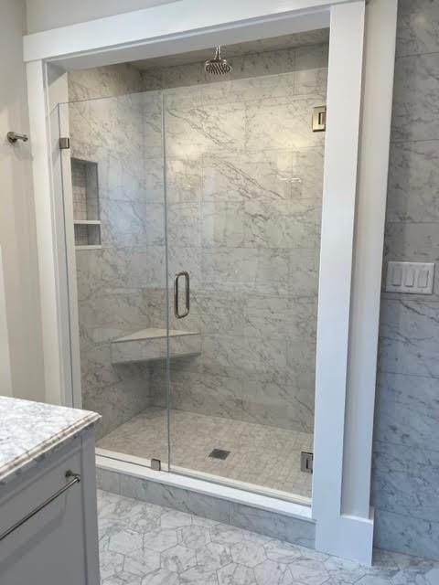 8 S St, Dennis, MA 02639 - bathroom with vanity, a marble finish shower, and marble finish flooring