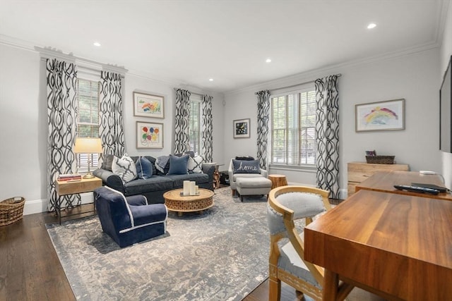 living area featuring crown molding, wood finished floors, baseboards, and recessed lighting