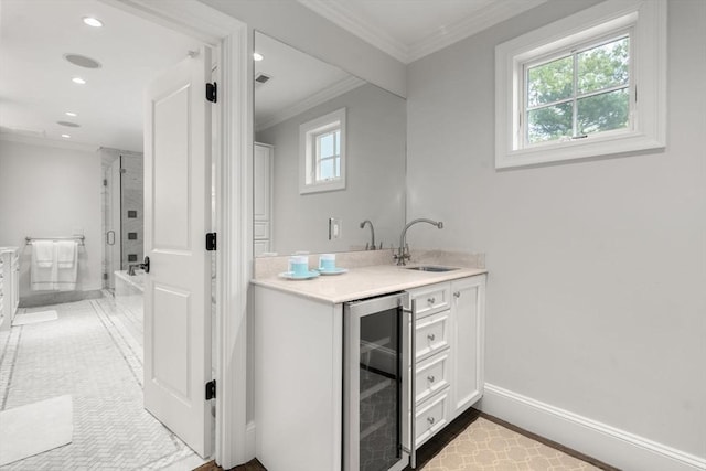 bar area with wine cooler, a sink, recessed lighting, ornamental molding, and baseboards